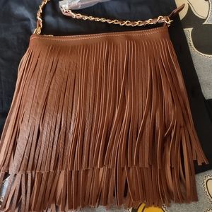 New without tags. Brown fringe shoulder/ crossbody bag. Please make an offer.